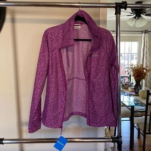 Rain jacket. Brand new with tags.